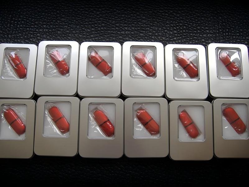 Red Capsule USB Drives Packed in Window Metal Tins