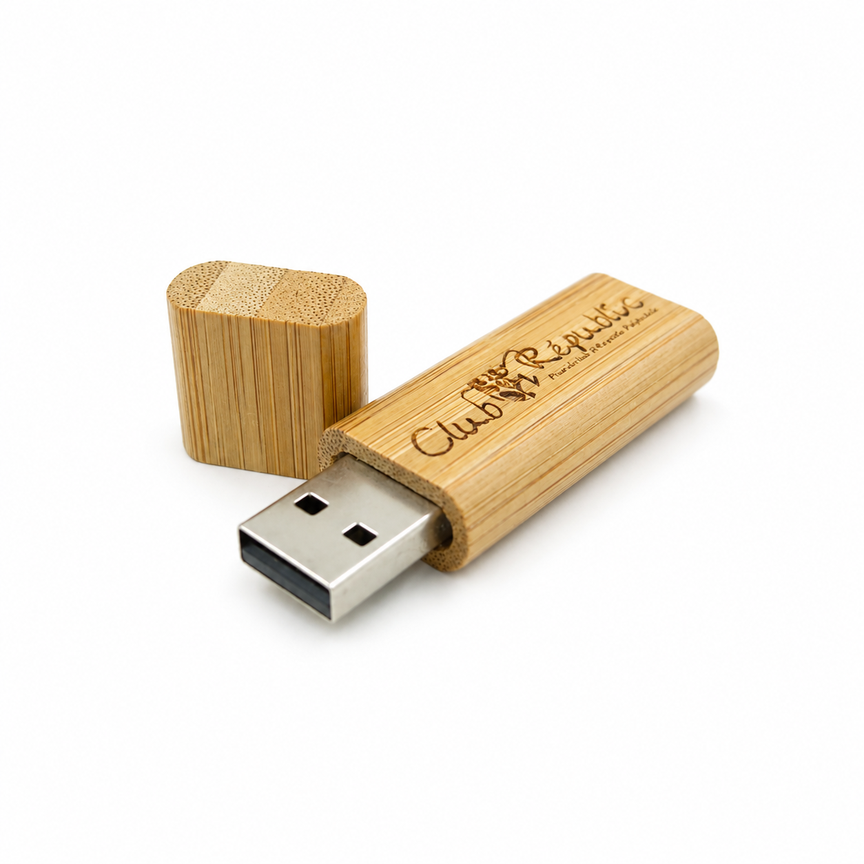 Engraved bamboo USB drive sample showing wood grain and finish