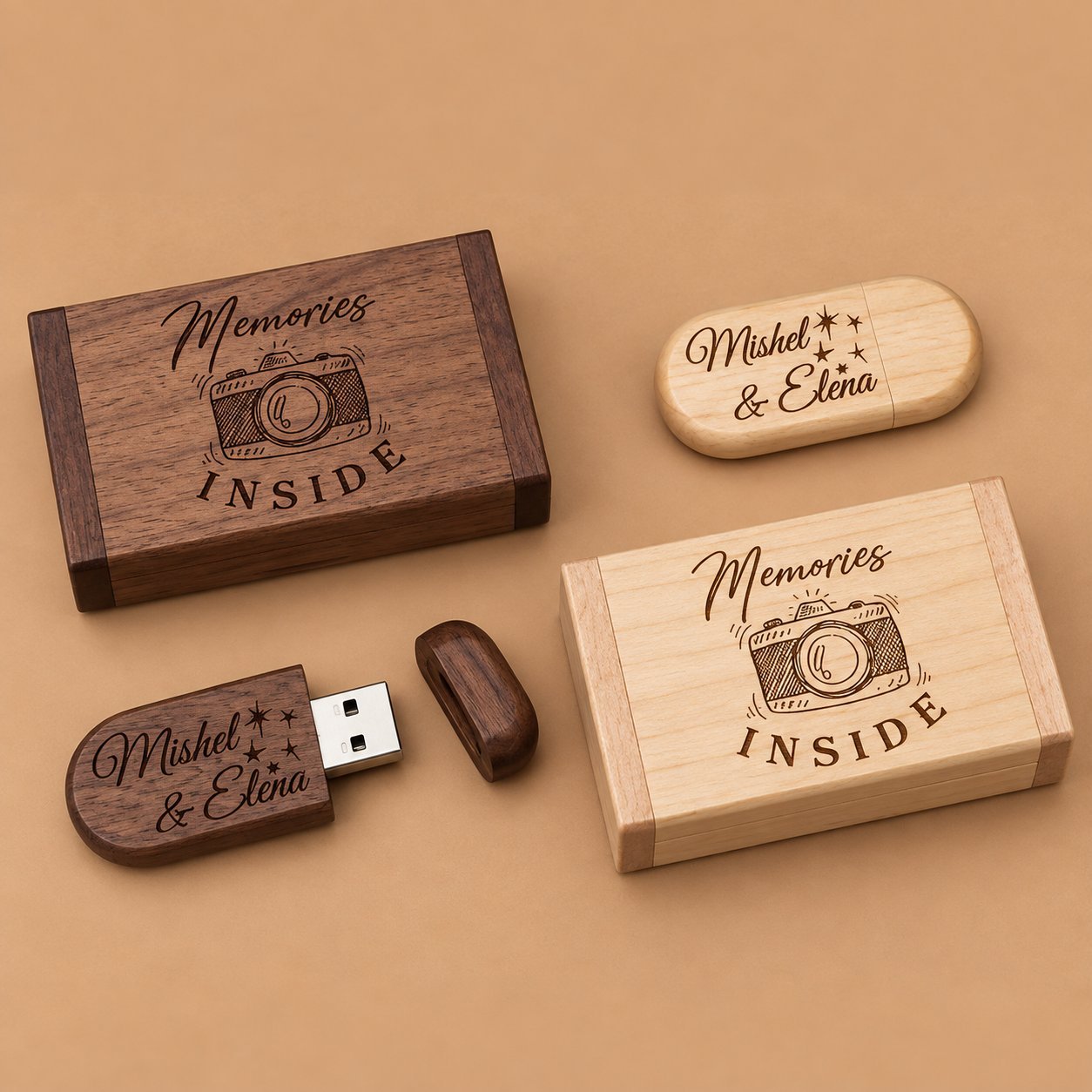 Two personalized wooden USB drives engraved Mishel and Elena in script, each paired with its own custom wooden keepsake box reading Memories Inside with a camera illustration, illustrating drive and box matched as a pair.