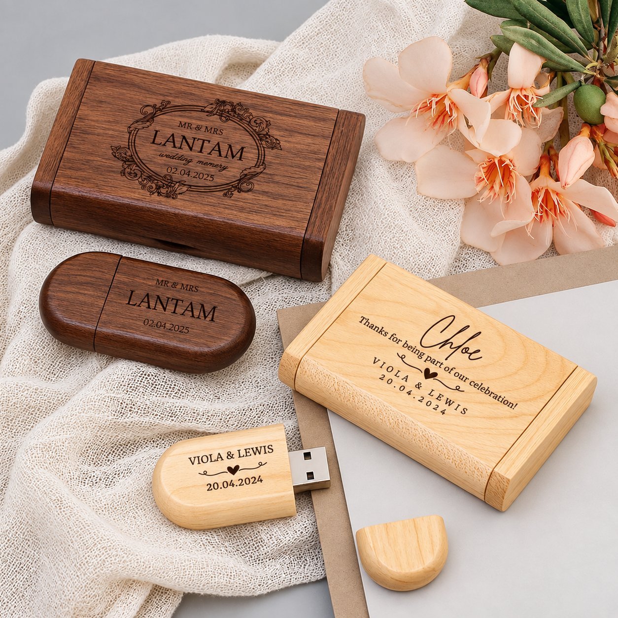 Walnut and bamboo wooden USB drives with laser-engraved wedding monograms and event dates, displayed with caps removed to show the closure style used in bulk wedding-favor packaging runs.