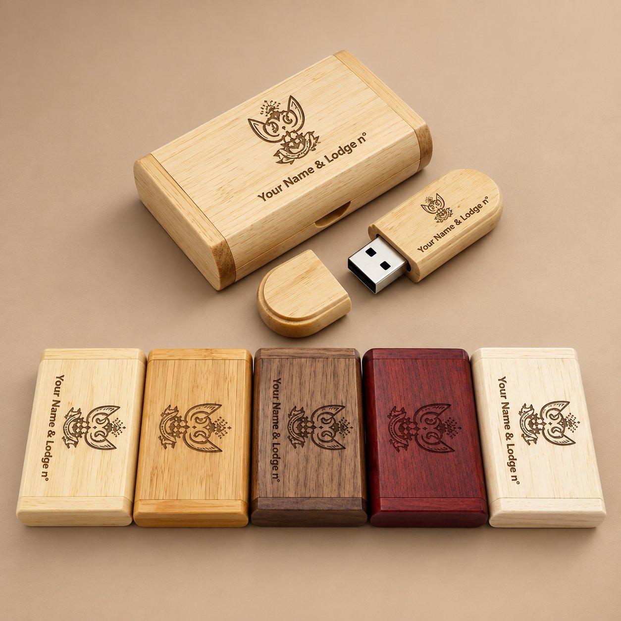 Five wooden USB drives laid out side by side in maple, bamboo, walnut, cherry, and lighter wood finishes to compare natural color variation