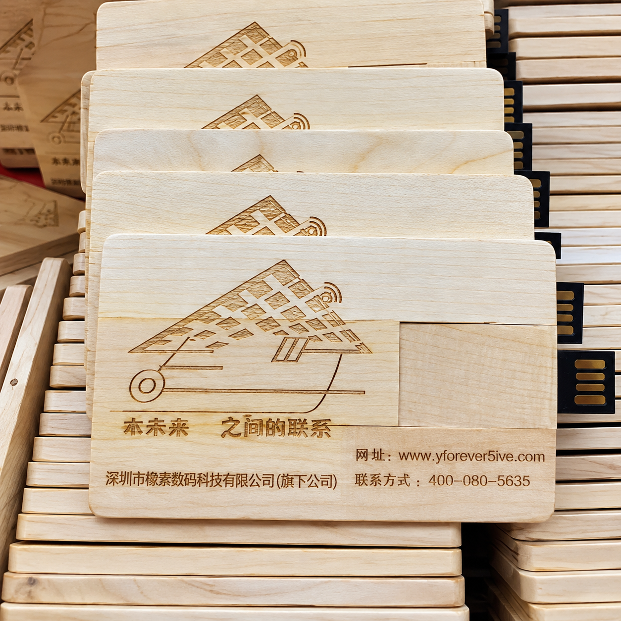 Stacked card style wooden USB drives with consistent engraving